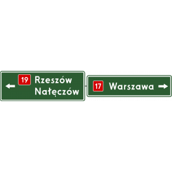 Znak E-2b Drogowskaz tablicowy umieszczany nad jezdnią